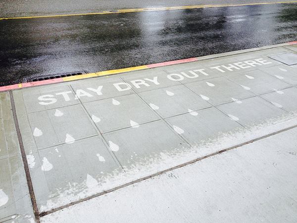 super-hydrophobic-wet-sidewalk-rain-street-art-rainworks-peregrine-church-2r