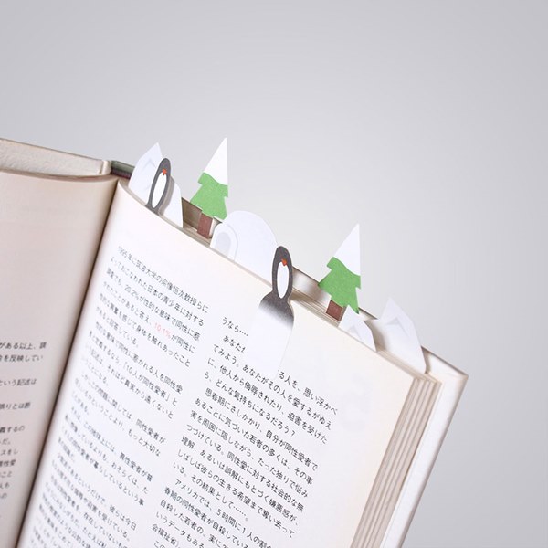 Tiny-paper-bookmarks-let-you-grow-charming-miniature-worlds-in-your-books2__880r