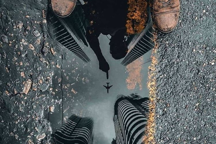 水たまりに映る不思議な世界観…絶妙な一瞬をとらえた一枚の画像が話題に！