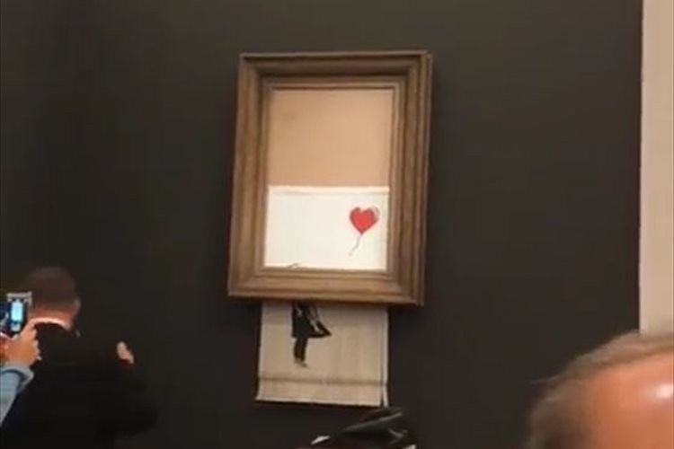 「自滅までが作品!?」140万ドルで落札された絵画が、落札された直後にシュレッダーされる