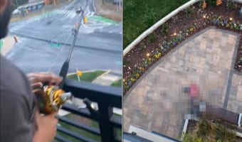 ベランダから釣り糸を垂らす男性。彼の釣果は・・・なんとまさかのファーストフード？！？！