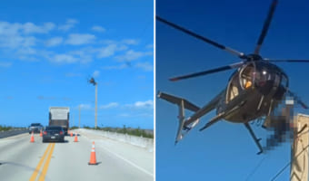 道路の上空でヘリコプターがホバリングしていると思ったら・・・、なんと機体を足場にして電線のメンテナンスをしている人がいたのです！！