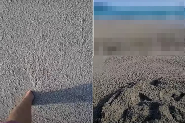 男性が泥沼を進んでいると思いきや、どうやらその泥らしきもので波までできている・・・。実はこれ、海岸まで打ち寄せた軽石だったのです