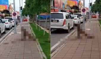 人通りもある歩道の真ん中でハグをしているのはとても意外な『ある生き物』!?もしかして、ハグじゃなくて取っ組み合いのケンカの最中でしたか?